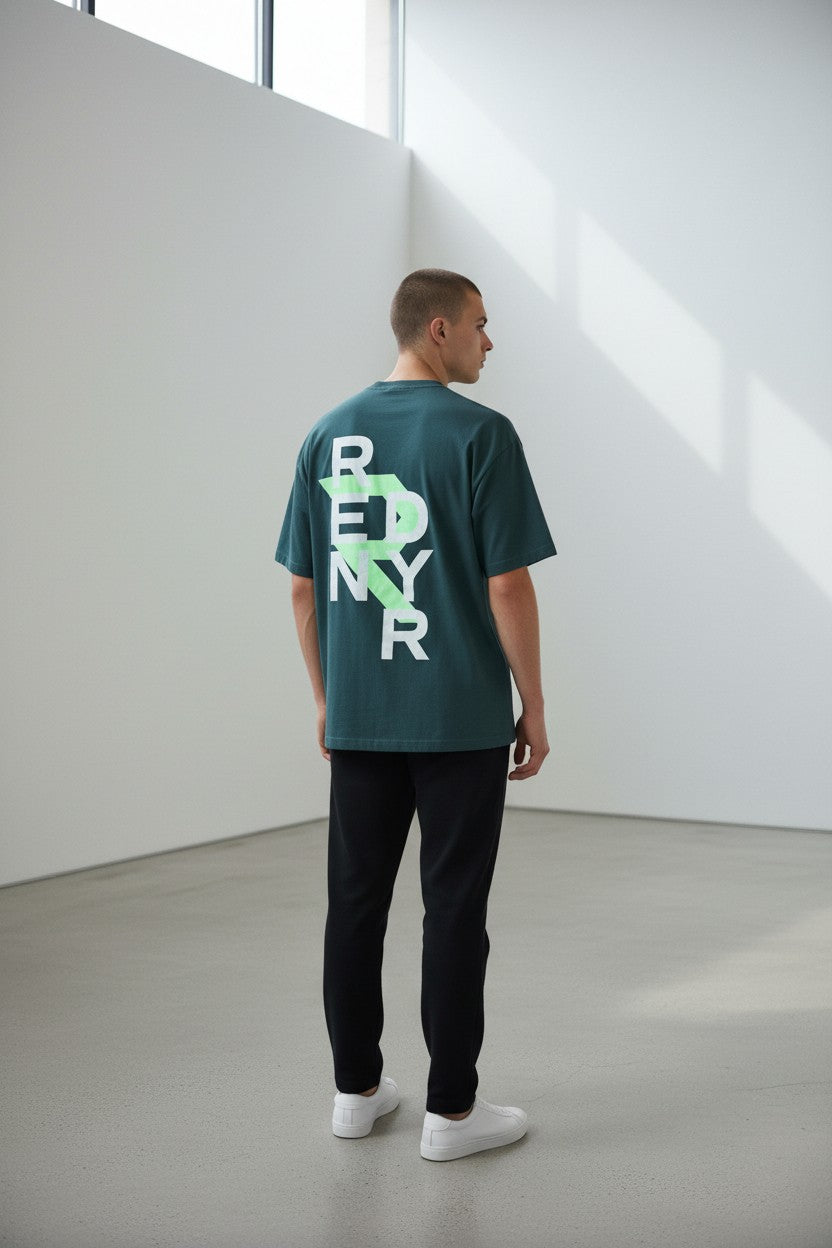 Model wearing oversized heavyweight graphic green tee - Rendyr BOLD Collection